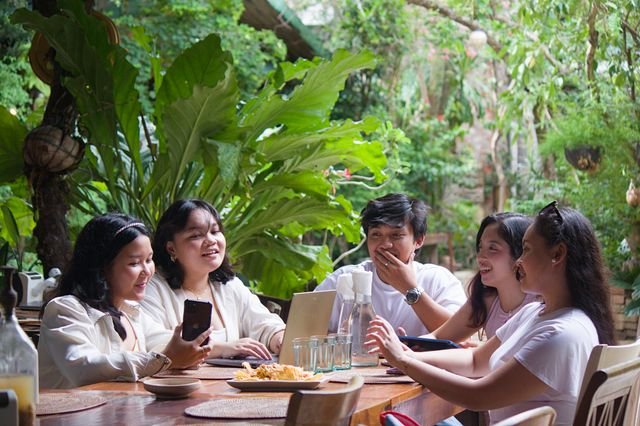The team sharing a meal together